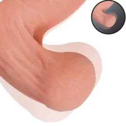 Dildo heiluvilla kiveksillä